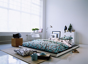 恬淡温馨的卧室家装效果实景图
